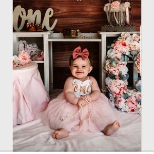 Pink Floral Party “ONE” Infant Dress. Size 6-12 months.